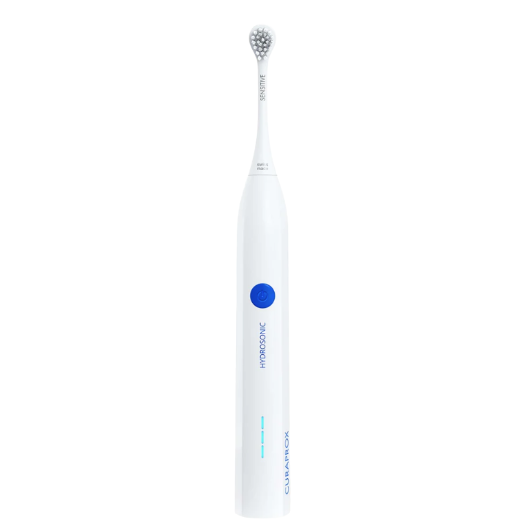 Curaprox Hydrosonic Easy electric toothbrush in white with the Sensitive brush head